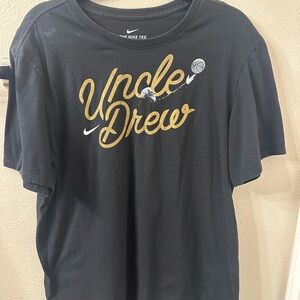 Nike Black Tee with Gold Accents